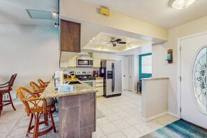 Fridge, microwave, oven, stovetop - Canal front home with private pool, lanai, and washer and dryer. (Cape Coral)