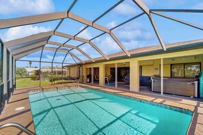 Pool - Canal front home with private pool, lanai, and washer and dryer. (Cape Coral)