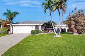 Property grounds - Waterfront home with saltwater pool, spacious outdoor area, and dock (Cape Coral)
