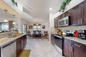 Fridge, microwave, oven, stovetop - Cozy home with private heated pool, lanai, & washer and dryer (Cape Coral)