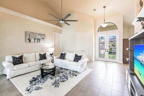 TV, offices - Modern waterfront retreat has pool with spa waterfall, close to Gulf beaches (Marco Island)