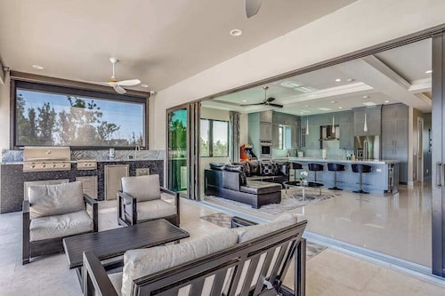 Spacious modern home close to beach with pool, central AC, & washer/dryer
