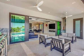 TV, fireplace, offices - Spacious modern home close to beach with pool, central AC, & washer/dryer (Bonita Springs)