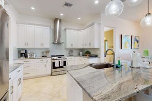 Fridge, microwave, oven, stovetop - Luxurious waterfront home - lovely water views, private pool, lenai patio (Cape Coral)