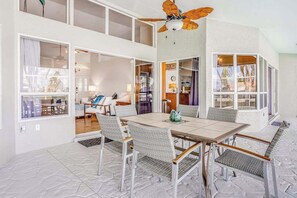 Outdoor dining - Stunning waterfront snowbird escape with private saltwater pool, dock, AC & W/D (Cape Coral)