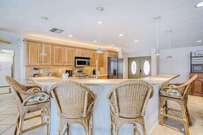 Fridge, microwave, oven, stovetop - Magical cape home on the water with furnished deck, pool, & amazing views (Cape Coral)