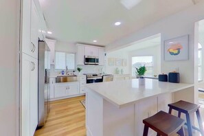 Fridge, microwave, oven, stovetop - Fully updated, canal-front home with pool, W/D, and central AC - great location (Cape Coral)