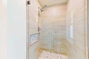 Shower, towels - Fully updated, canal-front home with pool, W/D, and central AC - great location (Cape Coral)
