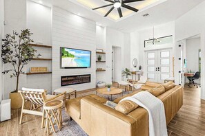 TV, fireplace, offices - Newly-built luxury home with private infinity pool, canal views, & washer/dryer (Cape Coral)