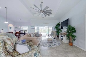 TV, offices - Waterfront home with private pool, dock, WiFi, central AC, and desk workspaces (Cape Coral)