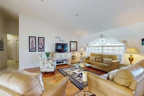 TV, DVD player - Spacious Lakefront Home with a Screened-In Pool in Exclusive Community (Fort Myers)