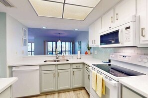 Fridge, microwave, oven, dishwasher - Corner Unit Condo with Private Balcony, and Shared Pool - Walk to Beach (Fort Myers Beach)