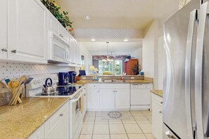 Fridge, microwave, oven, stovetop - Lakefront home with water view, golf, pool, hot tub, & tennis (Naples)