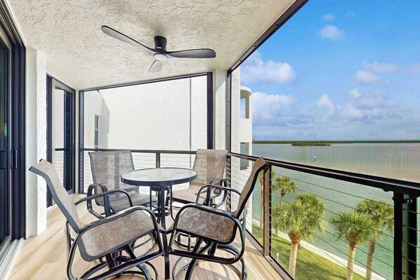 Terrace/patio - Waterview condo with shared pool, panoramic balcony views, and WIFI (Marco Island)