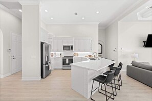 Fridge, microwave, oven, stovetop - Waterfront home with private heated pool, spa, BBQ, views & bikes (Marco Island)