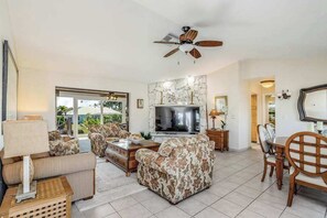 TV, offices - Canal-front home with private lagoon pool, dock, AC, & W/D - dog-friendly (Marco Island)
