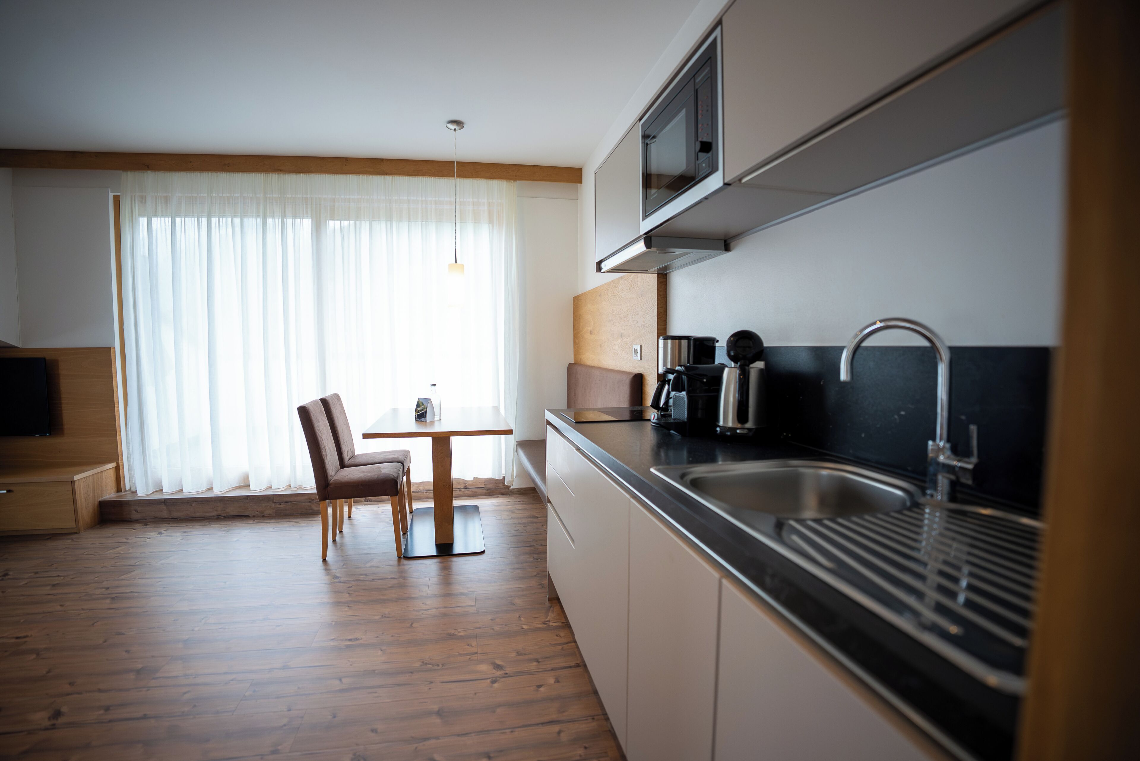 Apartamento exclusivo, 1 habitación | Cocina privada | Frigorífico, microondas, placa de cocina y lavavajillas