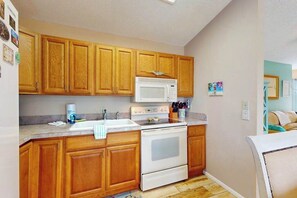 Fridge, microwave, oven, stovetop - Riverfront Getaway w/ Pool, Game Room & Snowbird Appeal – 30-Day Stay Required (Port Charlotte)