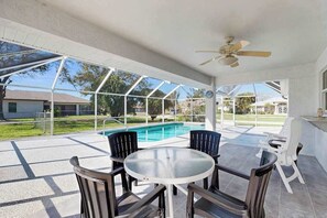 Outdoor dining - Coastal home with private pool, lanai, and washer & dryer (Cape Coral)