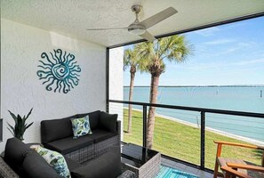 Terrace/patio - Water view condo with shared pool, panoramic balcony views, and WIFI (Marco Island)