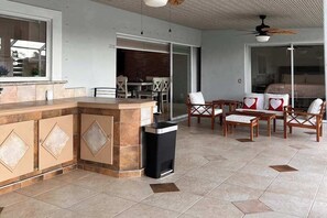 Outdoor dining - Incredible waterfront home with lanai, private pool, outdoor kitchen (Marco Island)