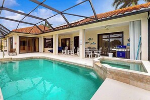 Pool - Canal-front home with private pool, pool spa, dock, boat access, grill, gym, W/D (Marco Island)