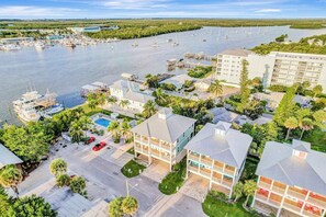 Exterior - Water-view villa with sunset balconies, grill, & pool - walk to beach and dining (Fort Myers Beach)