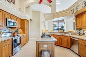 Fridge, microwave, oven, stovetop - Canal-front home with fast WiFi, pool, & lanai - near beach (Marco Island)