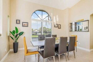 Dining - Canal-front home with fast WiFi, pool, & lanai - near beach (Marco Island)