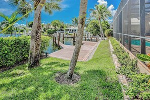Property grounds - Canal-front home with fast WiFi, pool, & lanai - near beach (Marco Island)