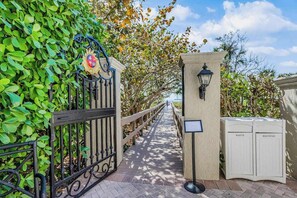 Property grounds - Beachfront condo with a pool, a hot tub, central AC, & on-site restaurants (Marco Island)