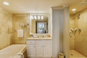 Shower, hair dryer, towels - Beachfront condo with a pool, a hot tub, central AC, & on-site restaurants (Marco Island)