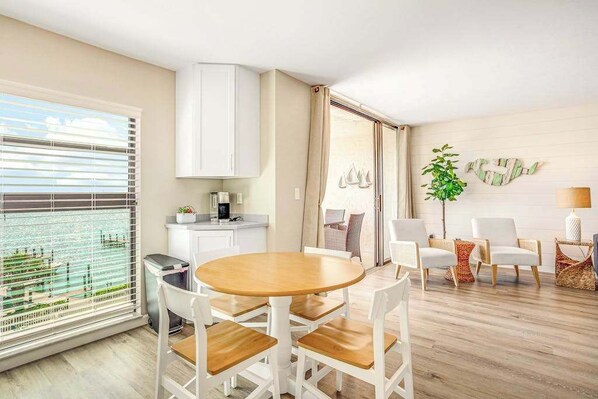 Dining - Bayfront condo with shared pool, dock, & water views - snowbird-friendly (Marco Island)