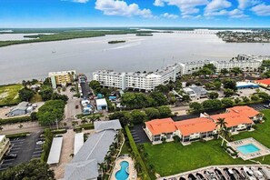 Exterior - Bayfront condo with shared pool, dock, & water views - snowbird-friendly (Marco Island)