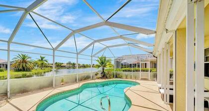 Country club retreat with private pool, water views, on-site golf, & gym