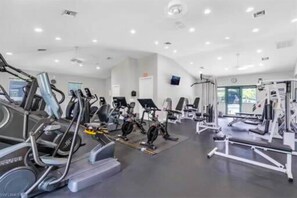 Fitness facility - Resort community home with bikes, screened porch, on-site golf, & AC (Naples)