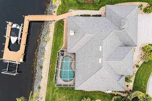 Exterior - Upscale waterfront home with private dock, saltwater pool, lanai, grill, & W/D (Naples)