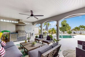 Terrace/patio - Waterfront Paradise: Heated Saltwater Pool, Private Dock, Snowbird-Friendly (Port Charlotte)
