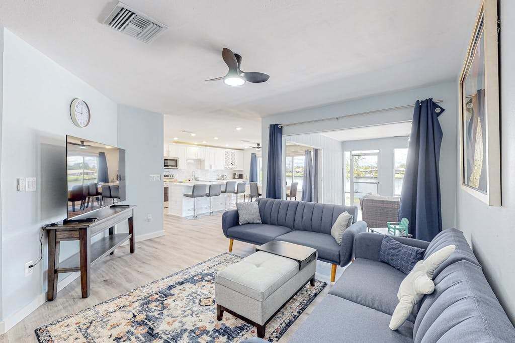 Stylish Waterfront Escape | Sunroom Views, Full Renovation, A/c & Prime Location - Port Charlotte, FL