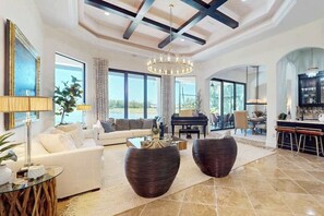 TV, offices - Deluxe home in a resort community with amazing views, pool, & hot tub (Naples)