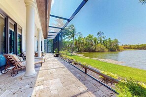 Terrace/patio - Deluxe home in a resort community with amazing views, pool, & hot tub (Naples)