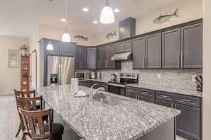 Fridge, microwave, oven, stovetop - Delightful home near beaches with heated pool, patio, lanai, grill, & streaming (Bonita Springs)