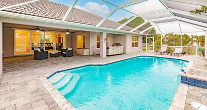 Delightful home near beaches with heated pool, patio, lanai, grill, & streaming