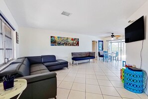 TV, DVD player, offices - Private home on the canal with dock, screened pool, patio, AC, & W/D - dog-friendly (Saint James City)