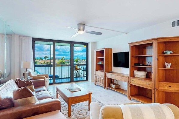 TV, offices - Waterfront condo with bay views, pool, tennis, pickleball, beach, & dock access (Marco Island)