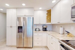 Fridge, microwave, oven, stovetop - Waterfront condo with bay views, pool, tennis, pickleball, beach, & dock access (Marco Island)