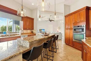 Fridge, microwave, oven, stovetop - Large corner lot home with canal views & screened in pool - close to the beach (Marco Island)