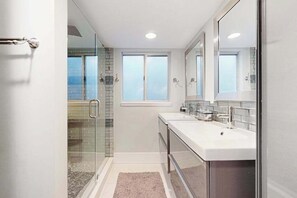 Shower, hair dryer, towels - Dog-friendly colorful condo with shaded patio, washer/dryer, & central AC (Naples)