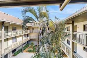 Property grounds - Peaceful top floor condo with golf views and resort amenities (Bonita Springs)