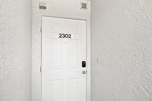 Interior - 3rd-floor snowbird-friendly condo with enclosed balcony, outdoor pool, W/D, AC (Naples)